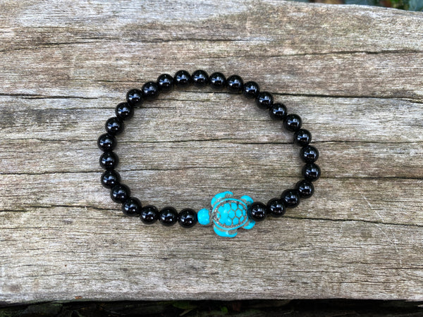 Bracelet élastique de Lithothérapie en Onyx naturel et tortue en Howlite